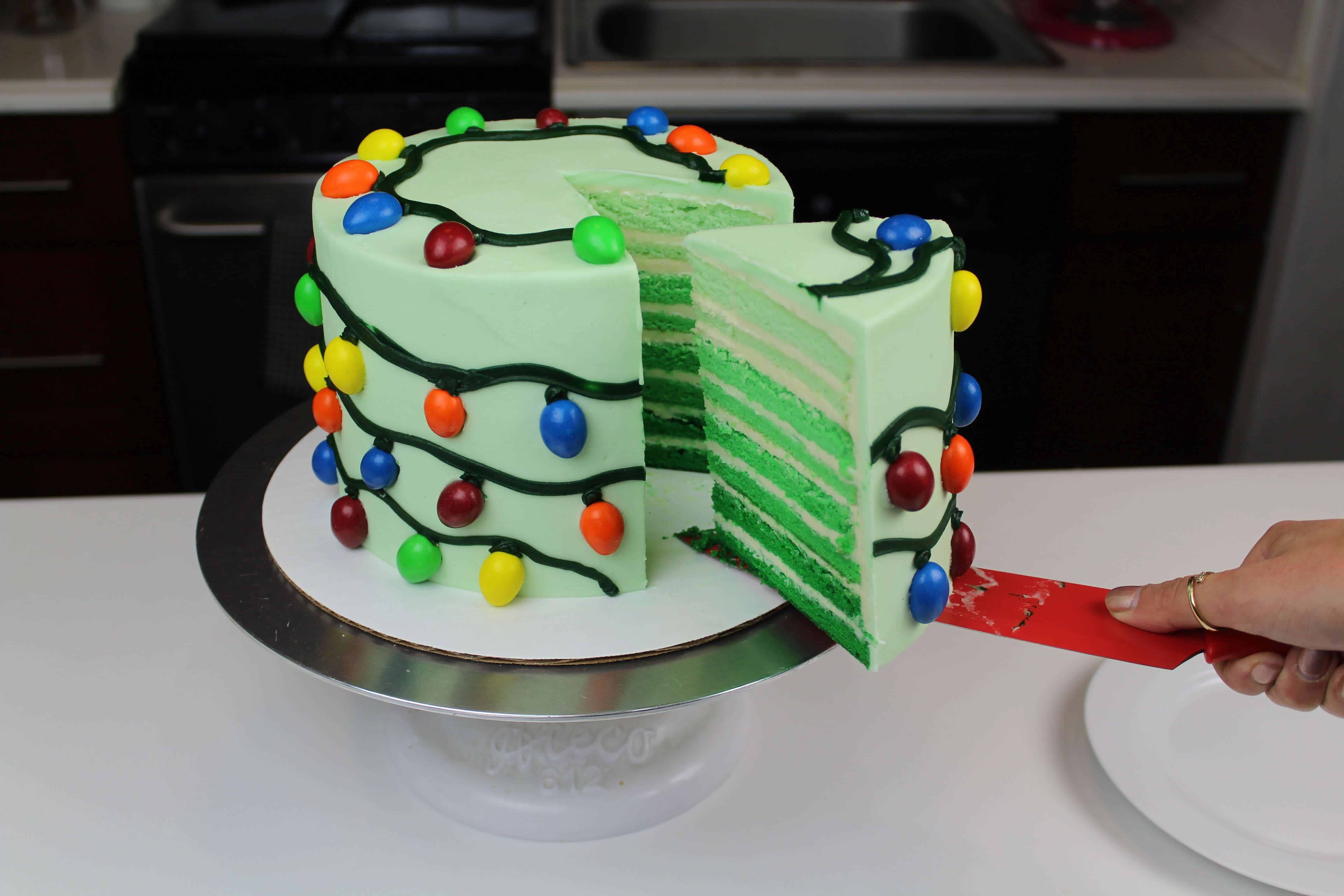 image of easy christmas tree lights cake made with M&Ms