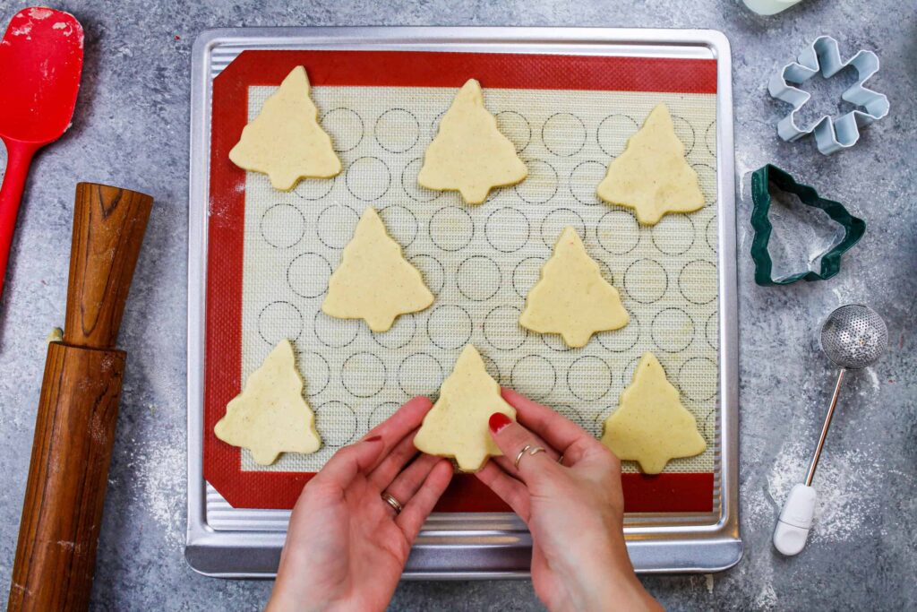 image of christmas tree sugar cookies cut out and ready to be baked