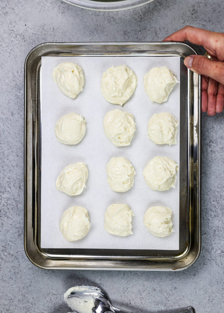 image of cheesecake filling scooped and ready to be frozen before being used to stuff cookies